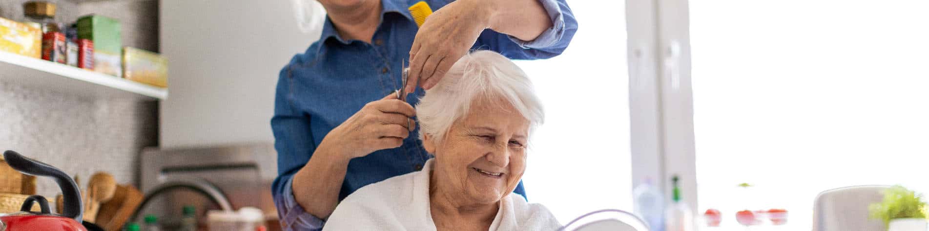 Personal Hygiene Checklist for Elderly Clients, Elderly Woman Getting Her Hair Cut by Her Caregiver