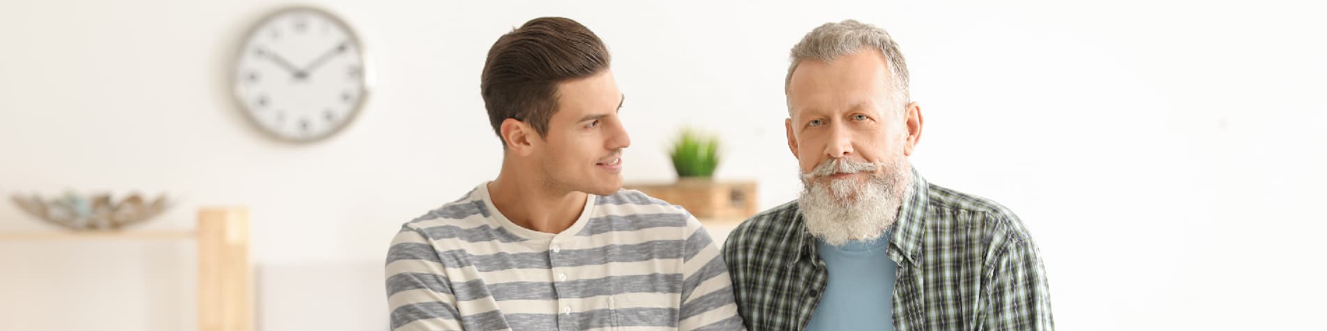 Elderly Man with His Caregiver